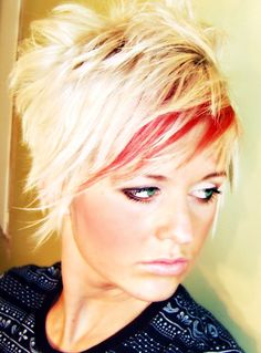 Shaggy blonde hair with red highlights