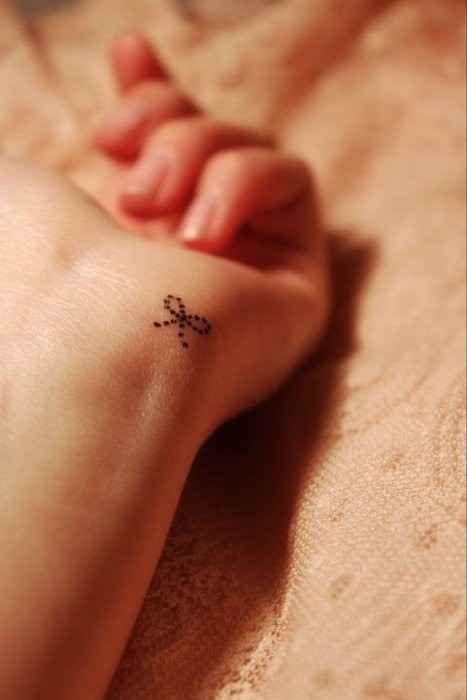 Bow tattoo