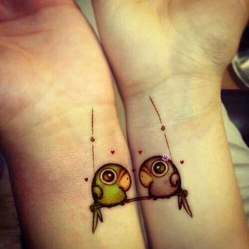 Small bird wrist tattoo