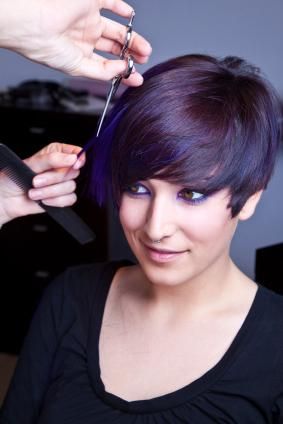 Colored short layered haircut with bangs