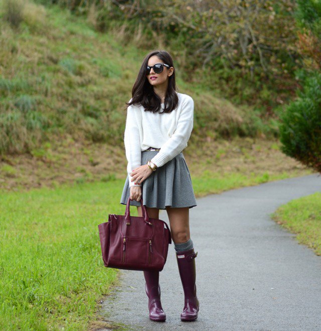 Burgundy rainy boots with a gray skirt