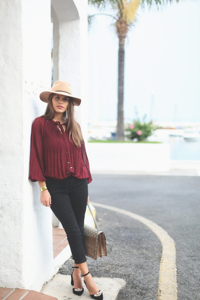 Burgundy top and black pants over