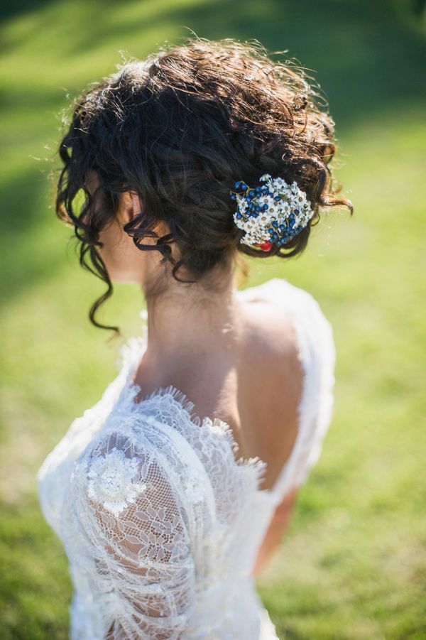 Black curly updo wedding hairstyle