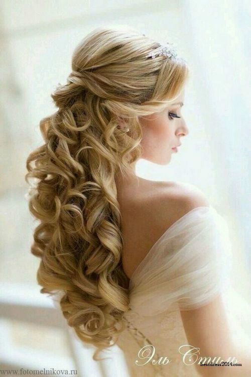 Stunning half up curly wedding hairstyle