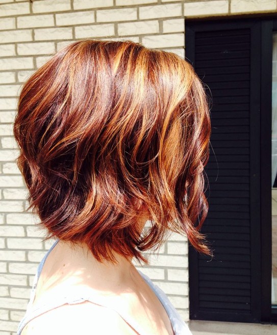 Short red hairstyle - side view of short red bob haircut