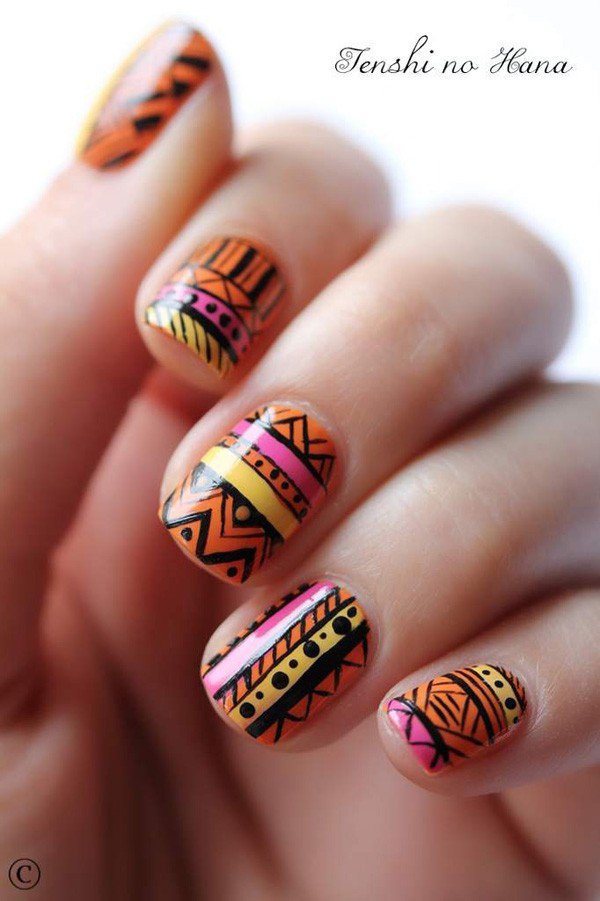 Orange tribal nail design