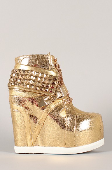 Side view of the Metallic Pyramid Chain Lace Up Wedge Sneakers with rivets
