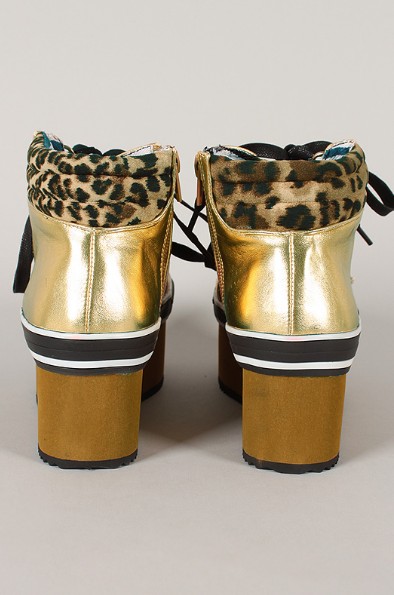 Rear view of the studded leopard flatform sneaker