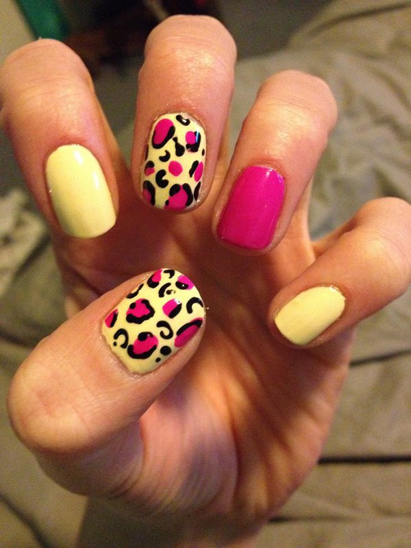 White and pink nail design with leopard print