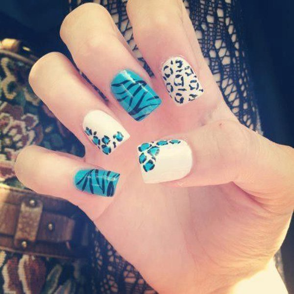 White and blue nail design with leopard print