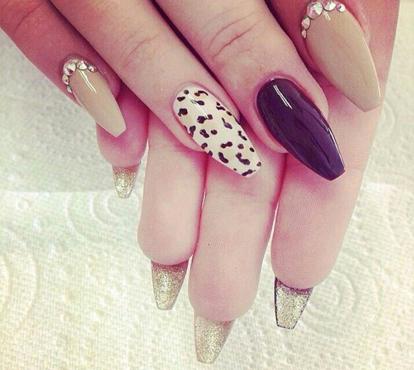 Stiletto nail design with leopard print