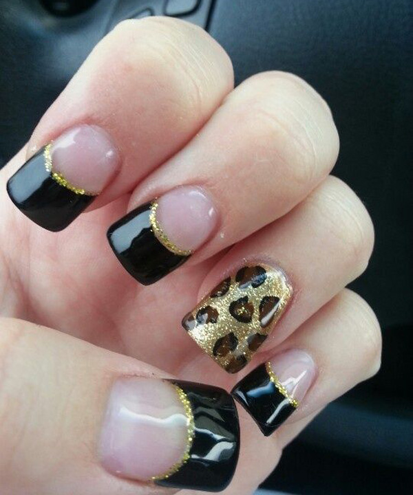 Black and gold nail design with leopard print