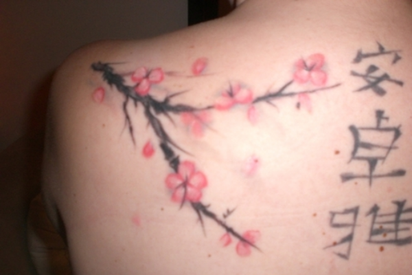 Cherry blossom tattoo with oriental symbols 