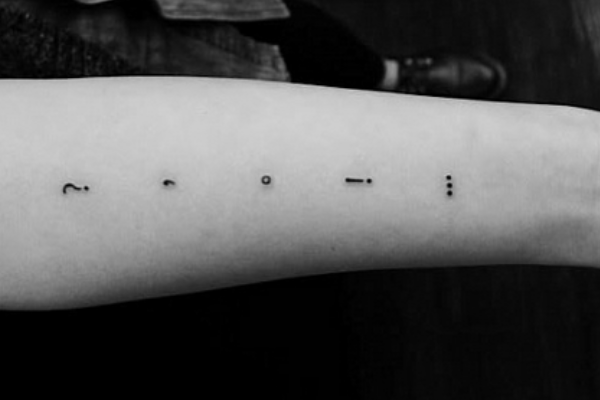 Punctuation tattoos