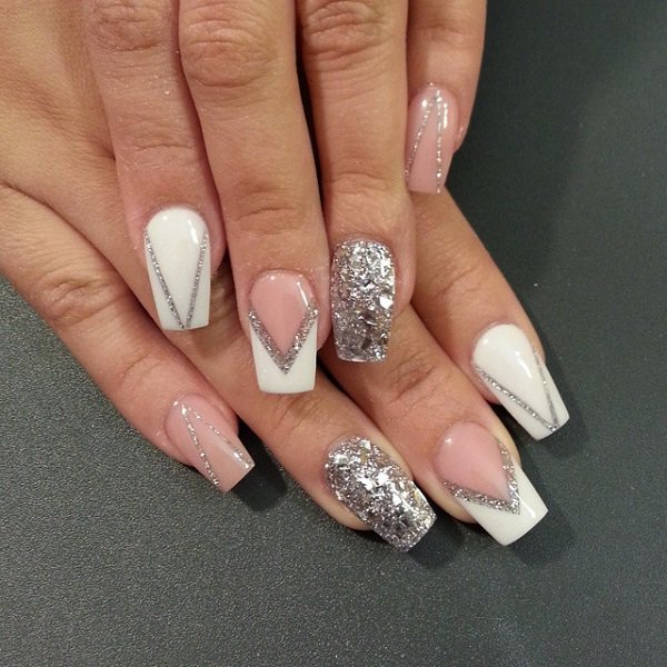 White and silver glitter nail design