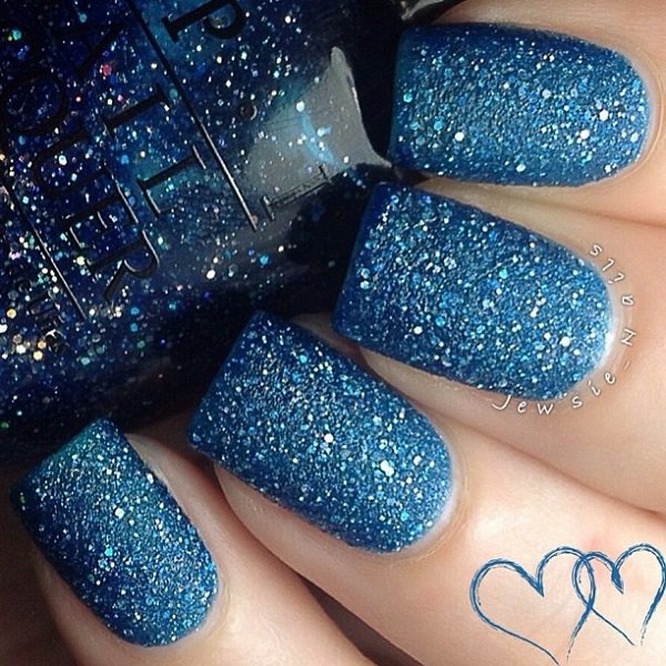 Full blue glitter nail design