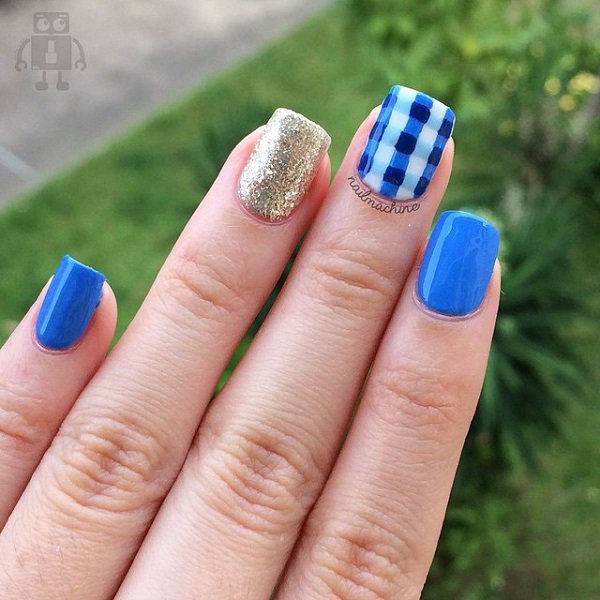 Blue checkered nail design