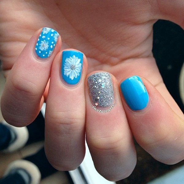 Blue glitter nail design