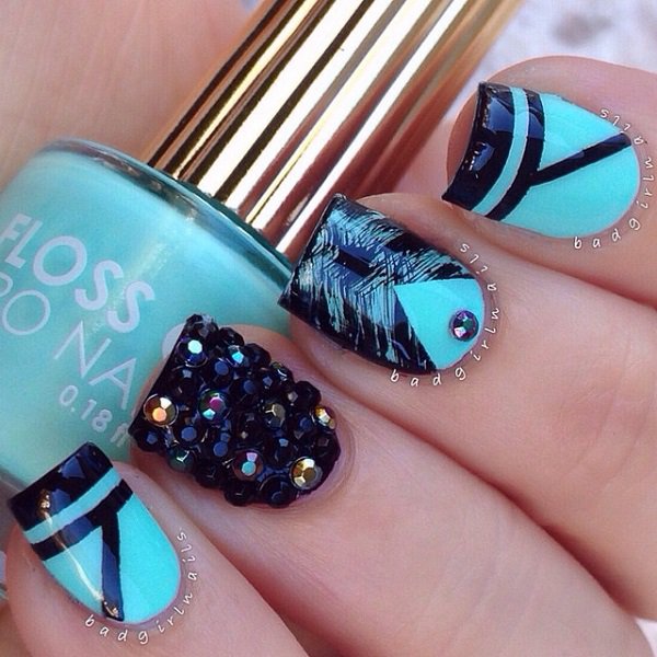 Blue embellished nail design