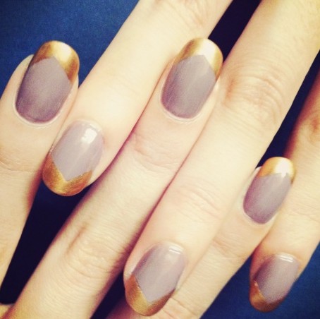 Simple lavender with asymmetrical gold tip nail design