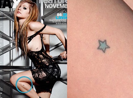 Avril Lavigne tattoos - blue star on the leg