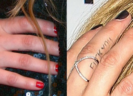 Avril Lavigne Tattoos - Finger Tattoo "FUCK YOU"