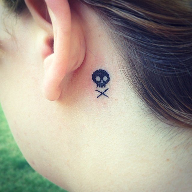 Sinister skull tattoo for women