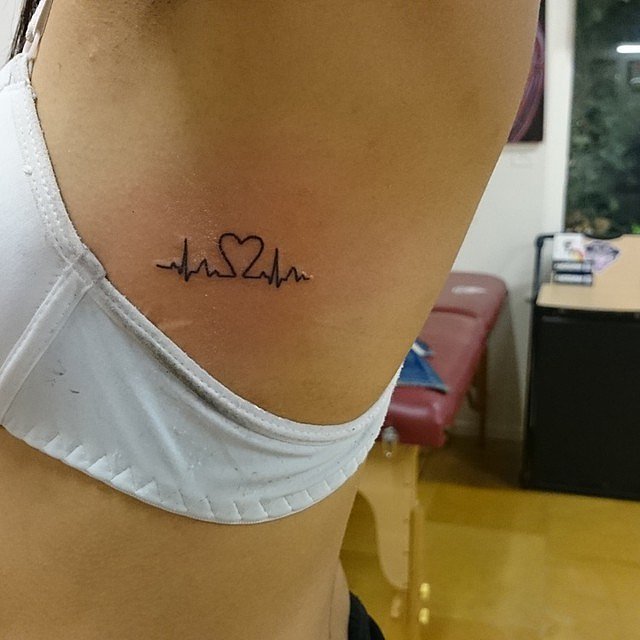 Heartbeat tattoo for women