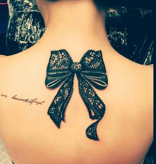 Pretty bow tattoo