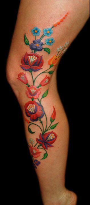 Colorful calf tattoo