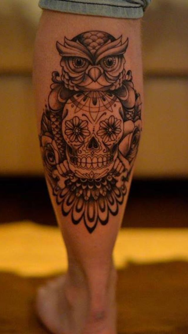 Skull and owl tattoo