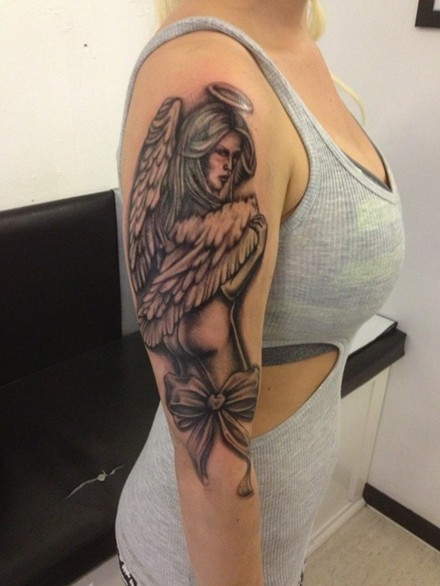 30 tattoos images: angel tattoo on arm