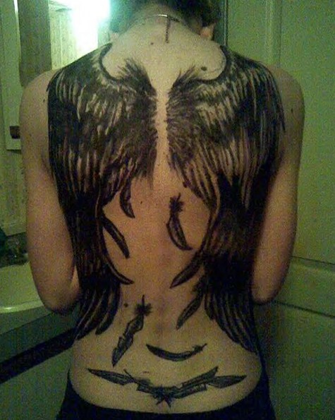 30 angel tattoos designs: fallen angel wings tattoo on the back