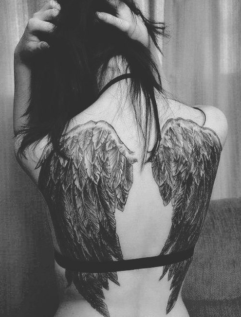 Angel tattoos designs for women and girls: Awesome Angel Wing tattoo on the back