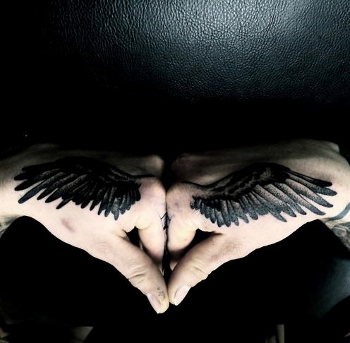 Angel tattoos designs: wing tattoos on hands