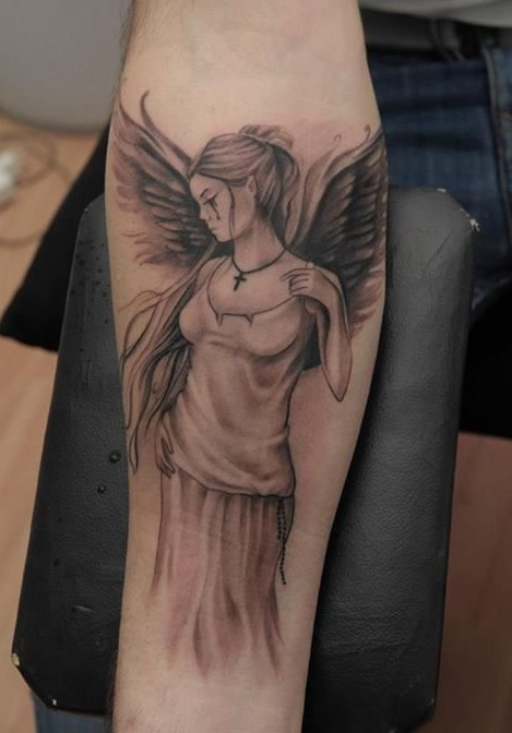 Angel tattoos designs: angel girl tattoo on wrist