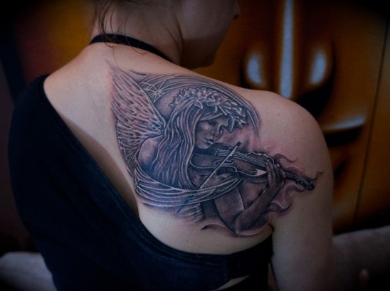 Angel tattoos designs: angel tattoo on shoulder