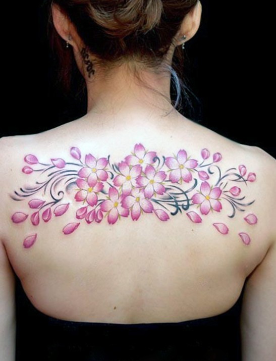 Flower tattoos designs for girls: cherry blossom tattoo upper back