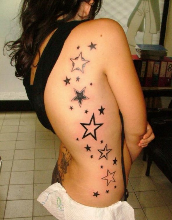 Star tattoo designs: side-of-body tattoos for girls