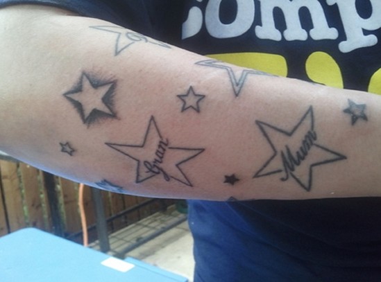 Star tattoo designs: shooting stars on hand tattoo