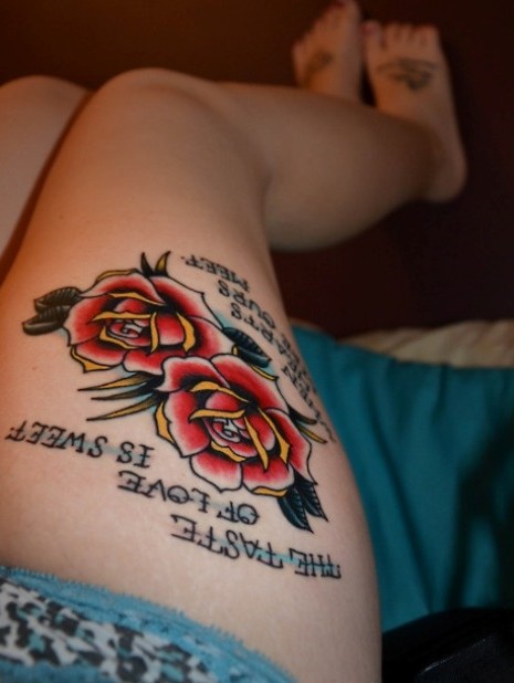 Cool rose tattoo on the thigh
