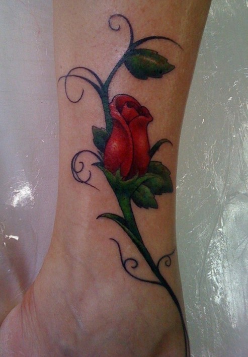 Rose tattoo on the leg