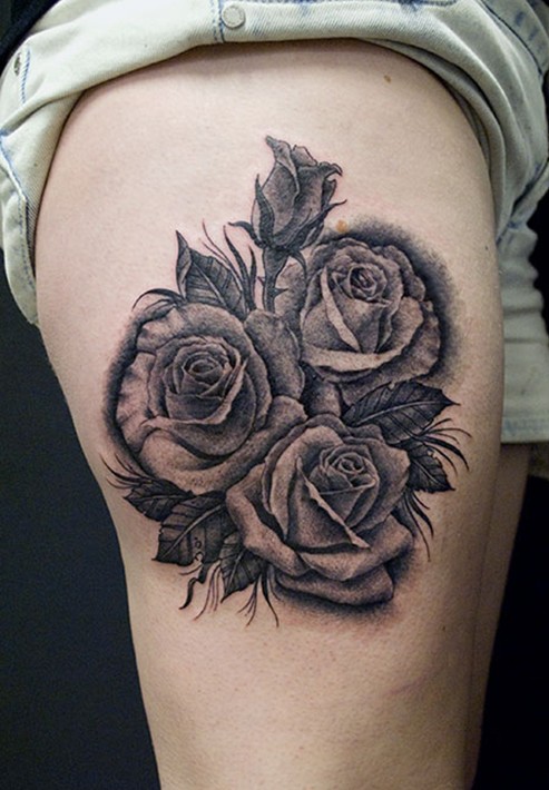 Rose tattoo: black and gray thigh