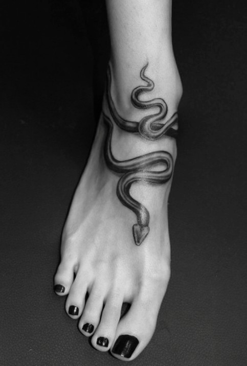 Snake tattoo on foot