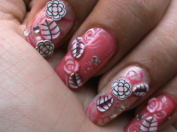 Pink nails with roses, rhinestones and leaves