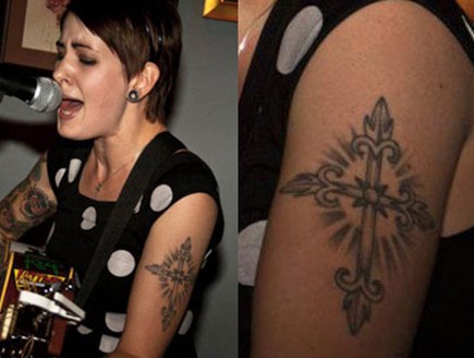 Beth Lucas Tattoos - shiny Christian cross on the left arm