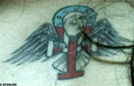 Amy Winehouse Tattoos - Ankh with wings