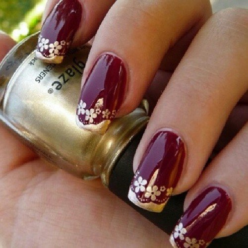Burgundy Nail Design With Floral Print "width =" 450 "srcset =" https://fashiontuner.com/wp-content/uploads/2020/02/1582807473_796_30-Amazing-Burgundy-Nail-Designs-for-Women-2019.jpg 500w, https://www.fashiontuner.com/wp-content/uploads/2014/07/Burgundy-Nail-Design-With-Floral-Print-200x200.jpg 200w, https://www.fashiontuner.com/wp-content /uploads/2014/07/Burgundy-Nail-Design-With-Floral-Print-120x120.jpg 120w "sizes =" (max-width: 500px) 100vw, 500px