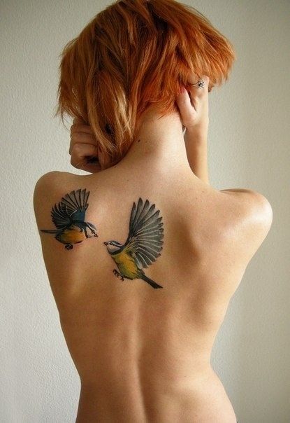 Bird tattoo on the shoulder