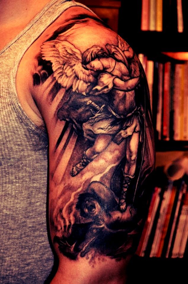 Angel arm tattoo